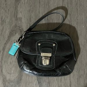 COACH Poppy Black Leather Push Lock Oval Wristlet